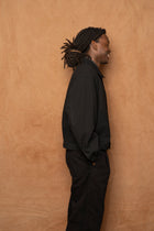 trucker jacket in black cotton silk