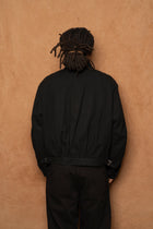 trucker jacket in black cotton silk