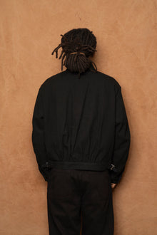 trucker jacket in black cotton silk