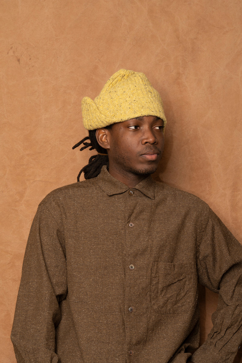 flap beanie in speckled mustard