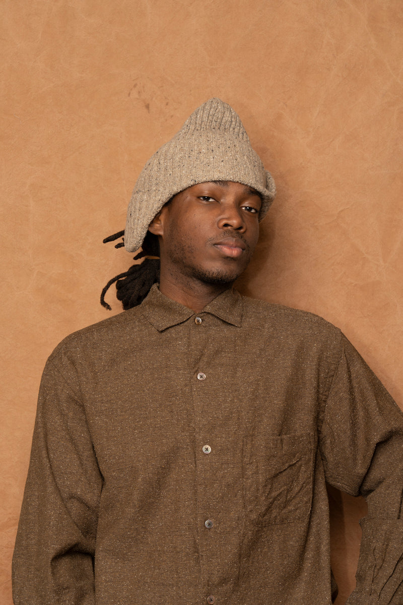 flap beanie in speckled beige
