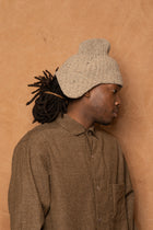 flap beanie in speckled beige