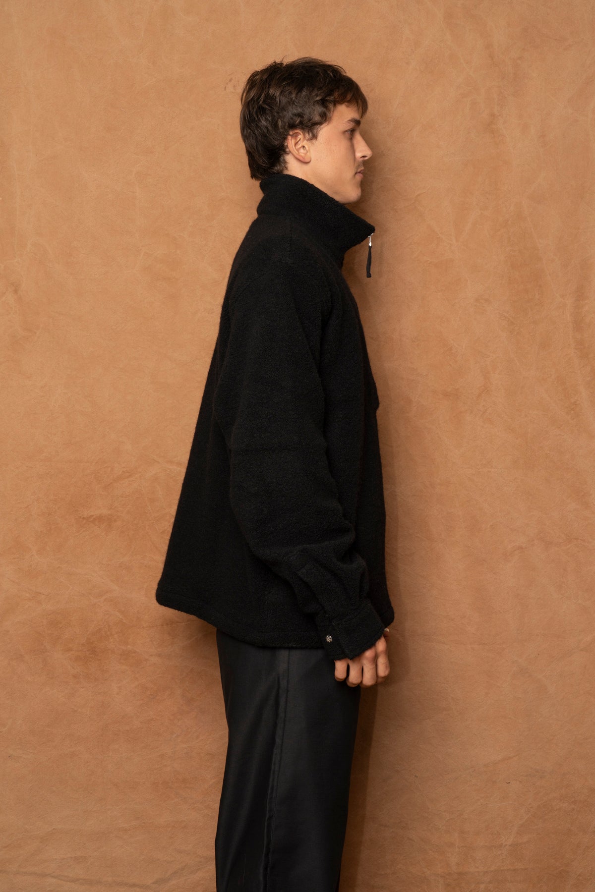traveler 1/2 zip in black