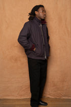 holmen wax raglan insulated jacket in darkest purple
