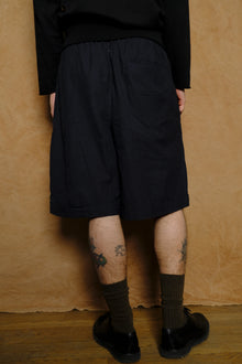 wide shorts in hand loomed black cotton