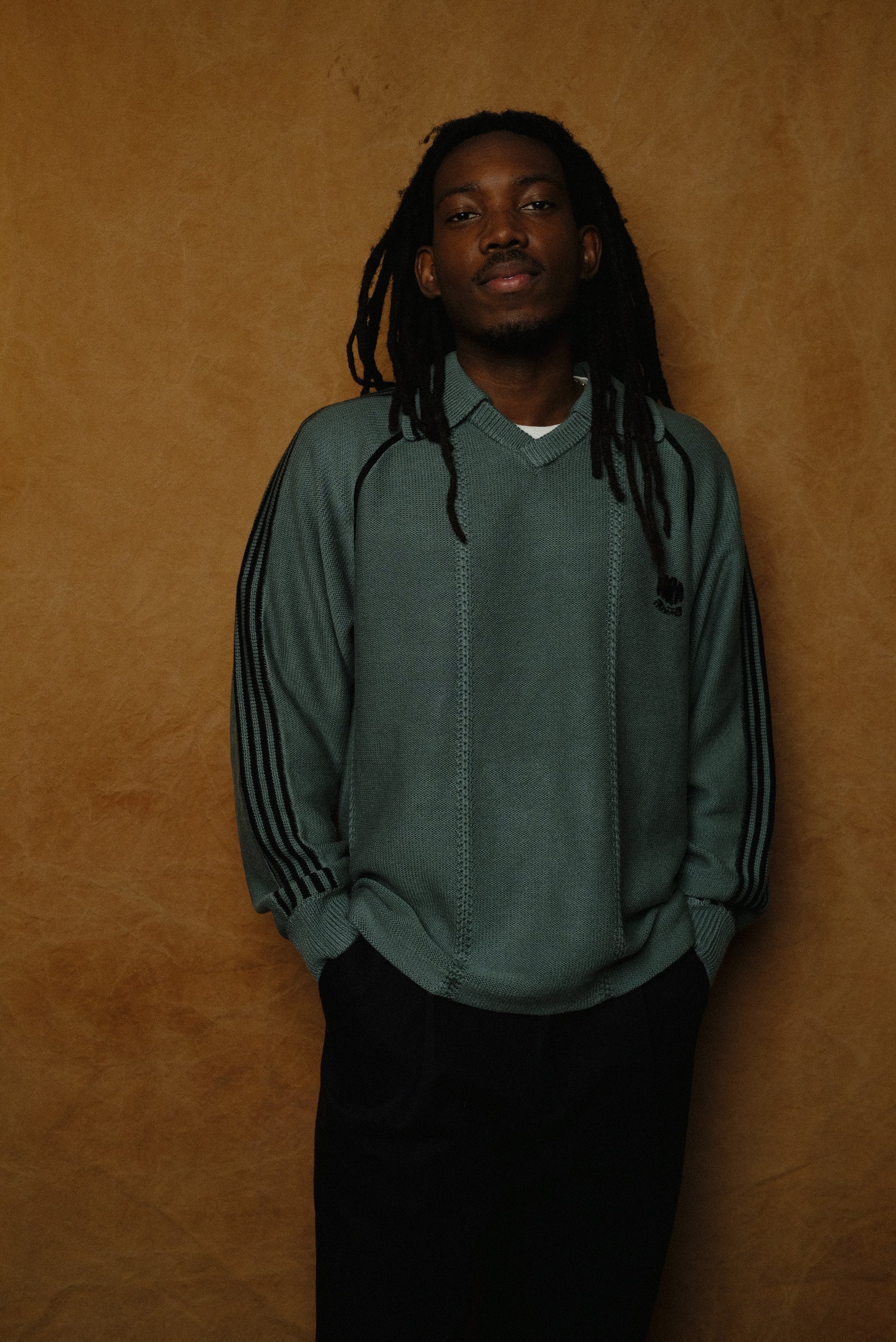 knitting game shirt in dark green