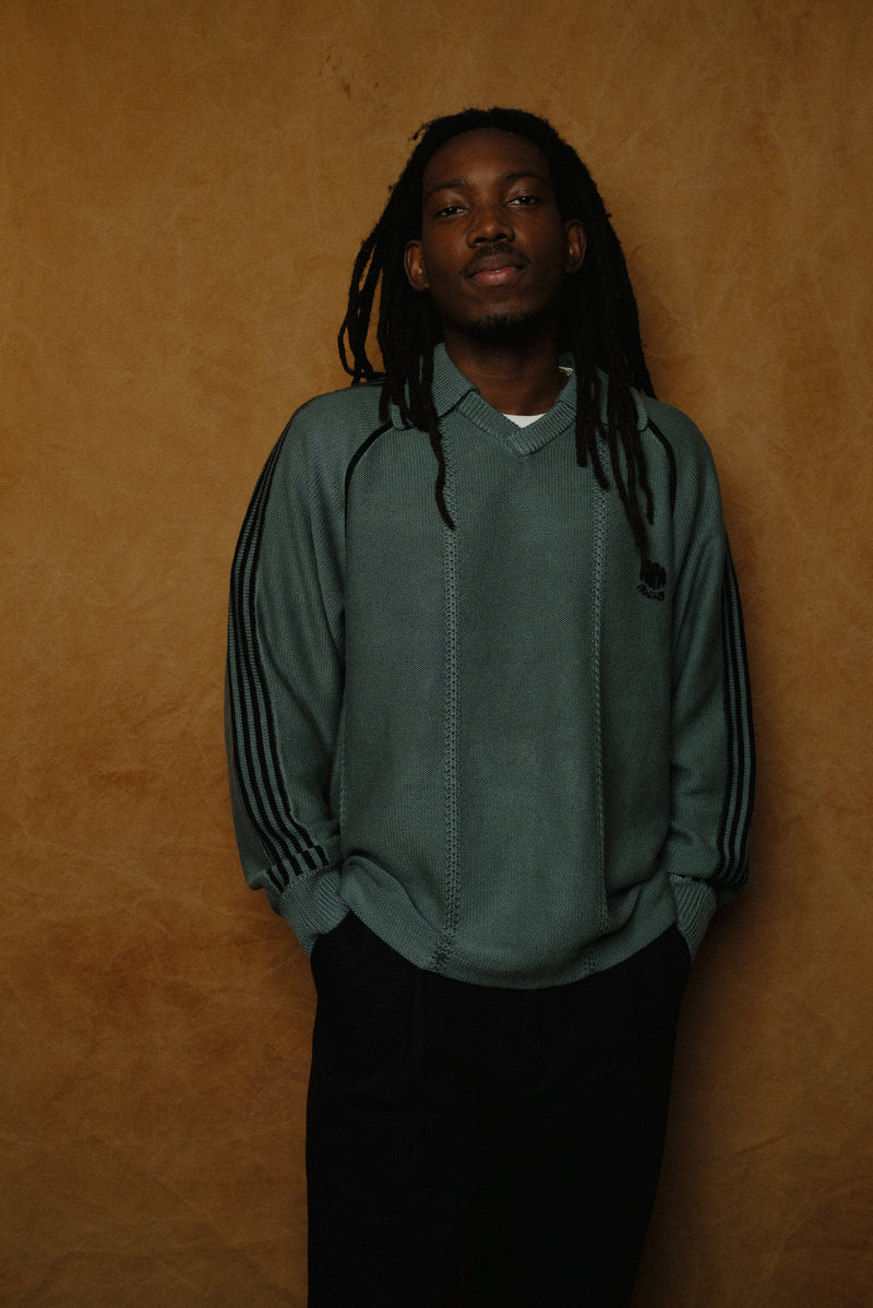 knitting game shirt in dark green