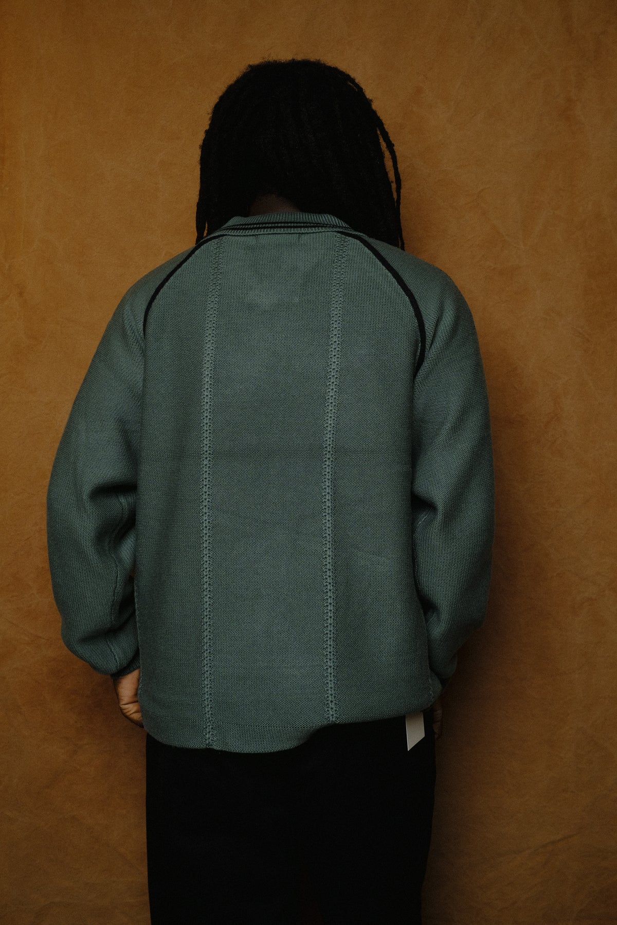 knitting game shirt in dark green