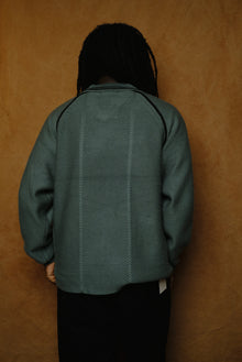 knitting game shirt in dark green