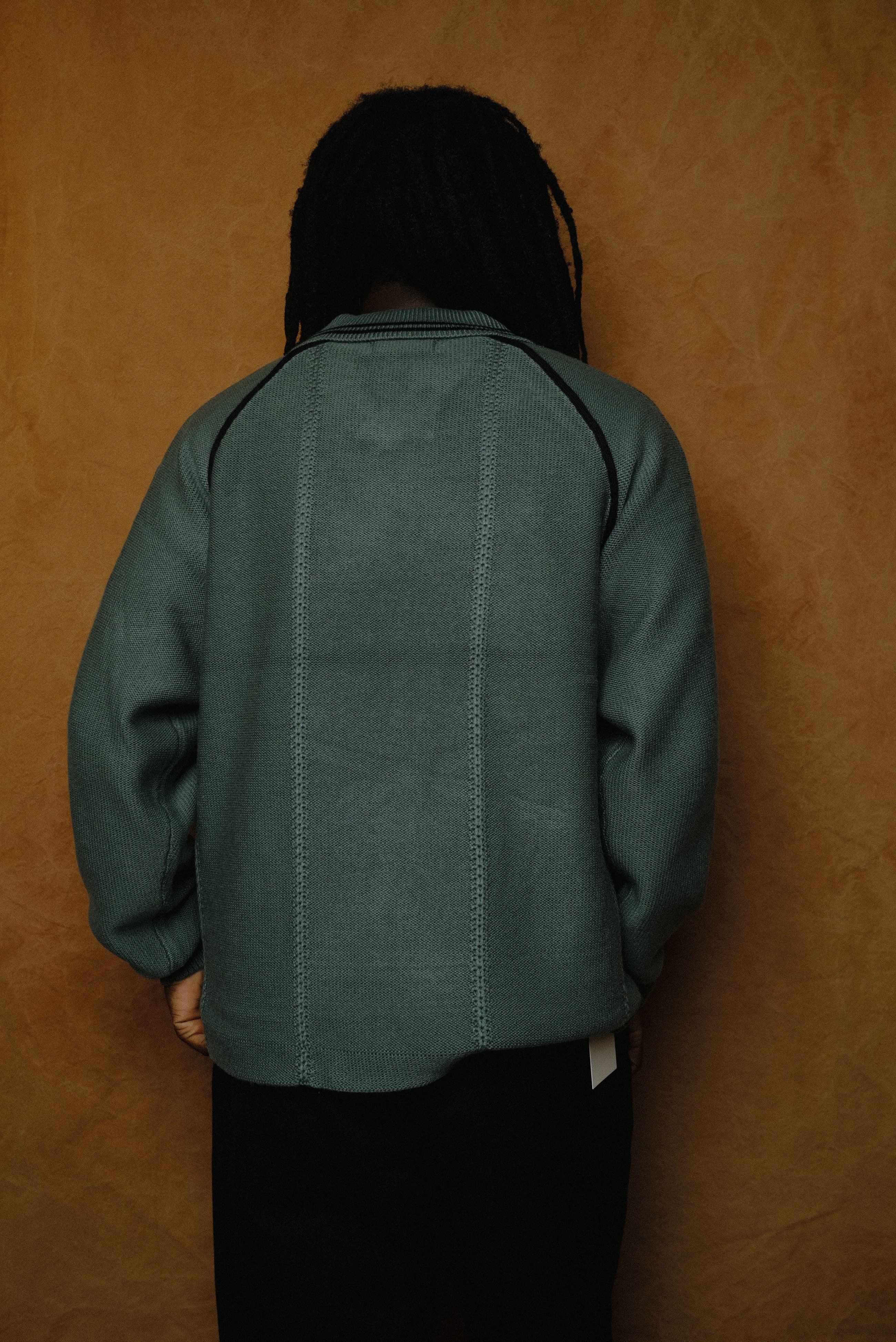 knitting game shirt in dark green
