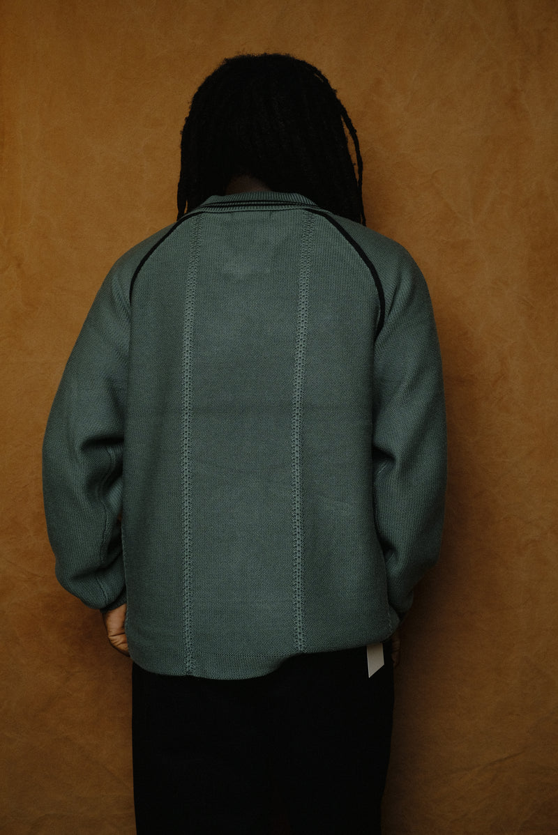 knitting game shirt in dark green