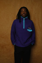 mountain knitting pullover in purple