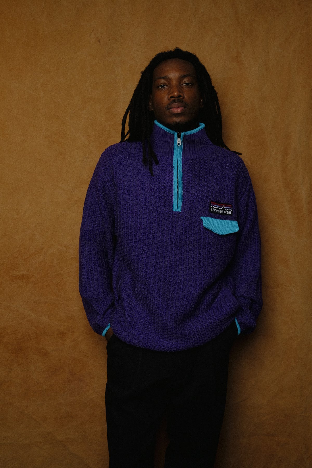 mountain knitting pullover in purple