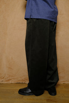 mika in green corduroy